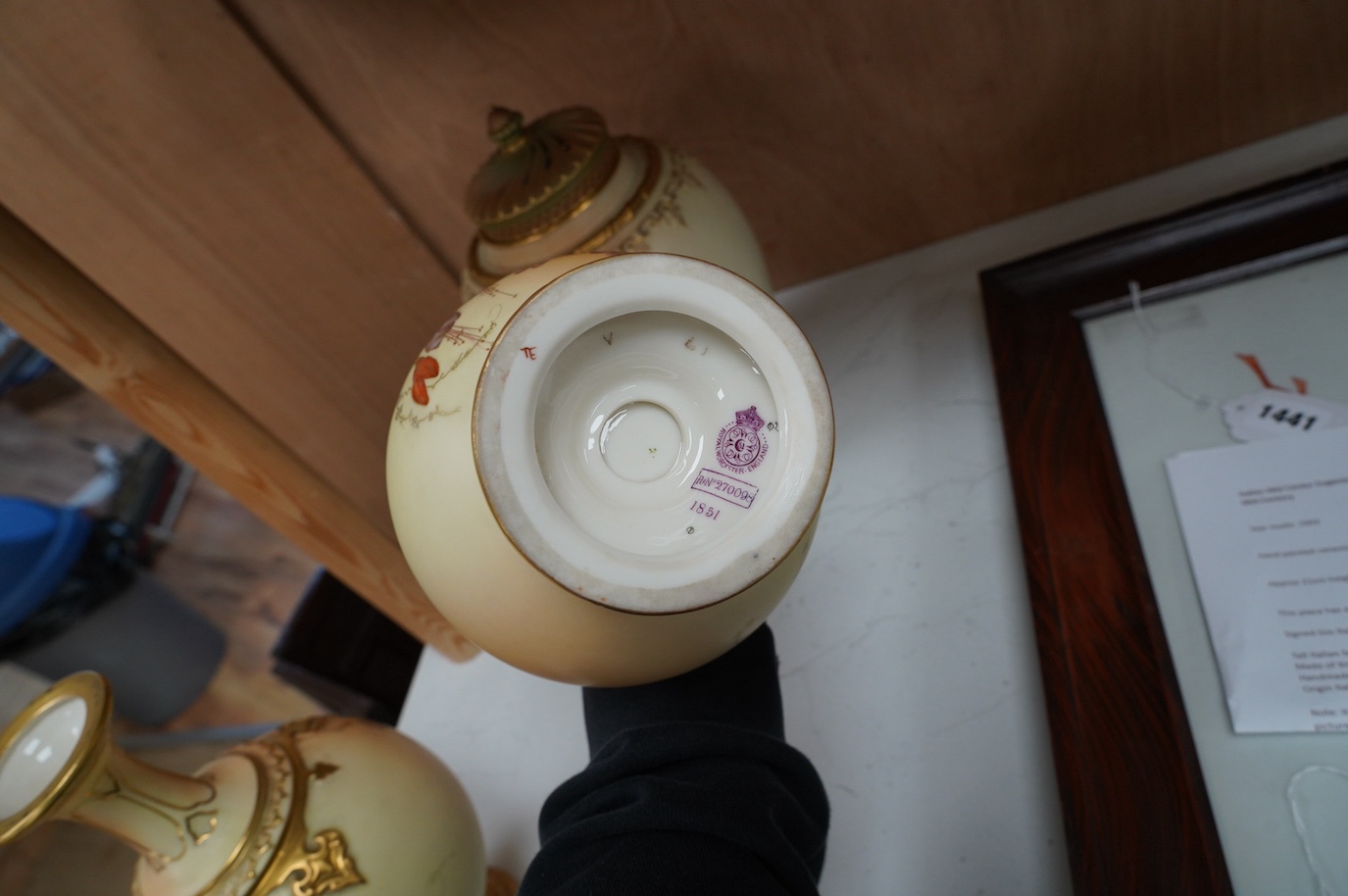 A Worcester blush ivory jar and cover, and a pair of similar vases, shape numbers 2048 and 1851, tallest 26cm. Condition - good